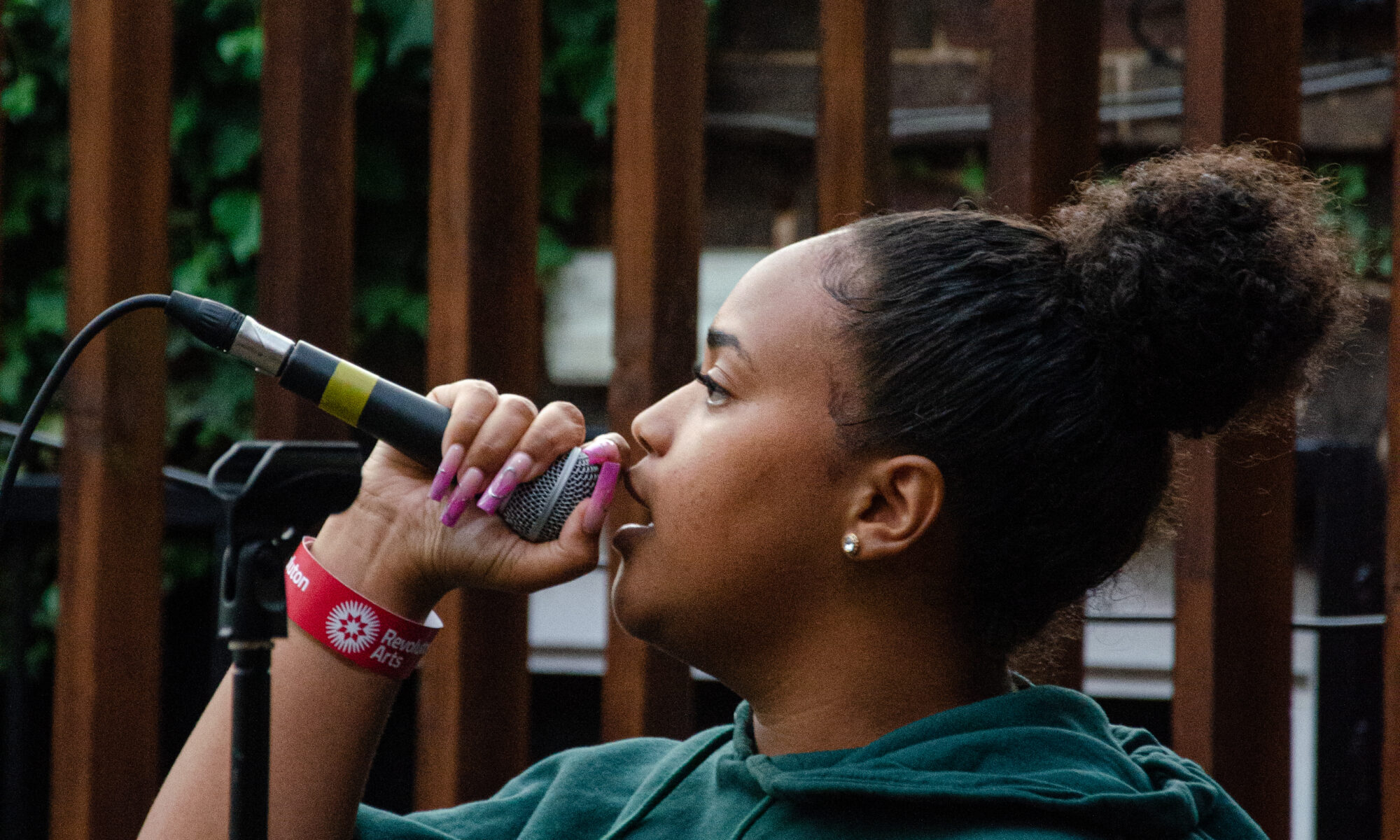A woman singing into a microphone