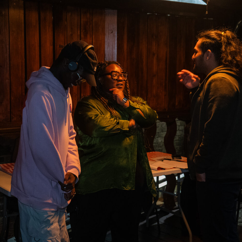 Three participants in active conversation