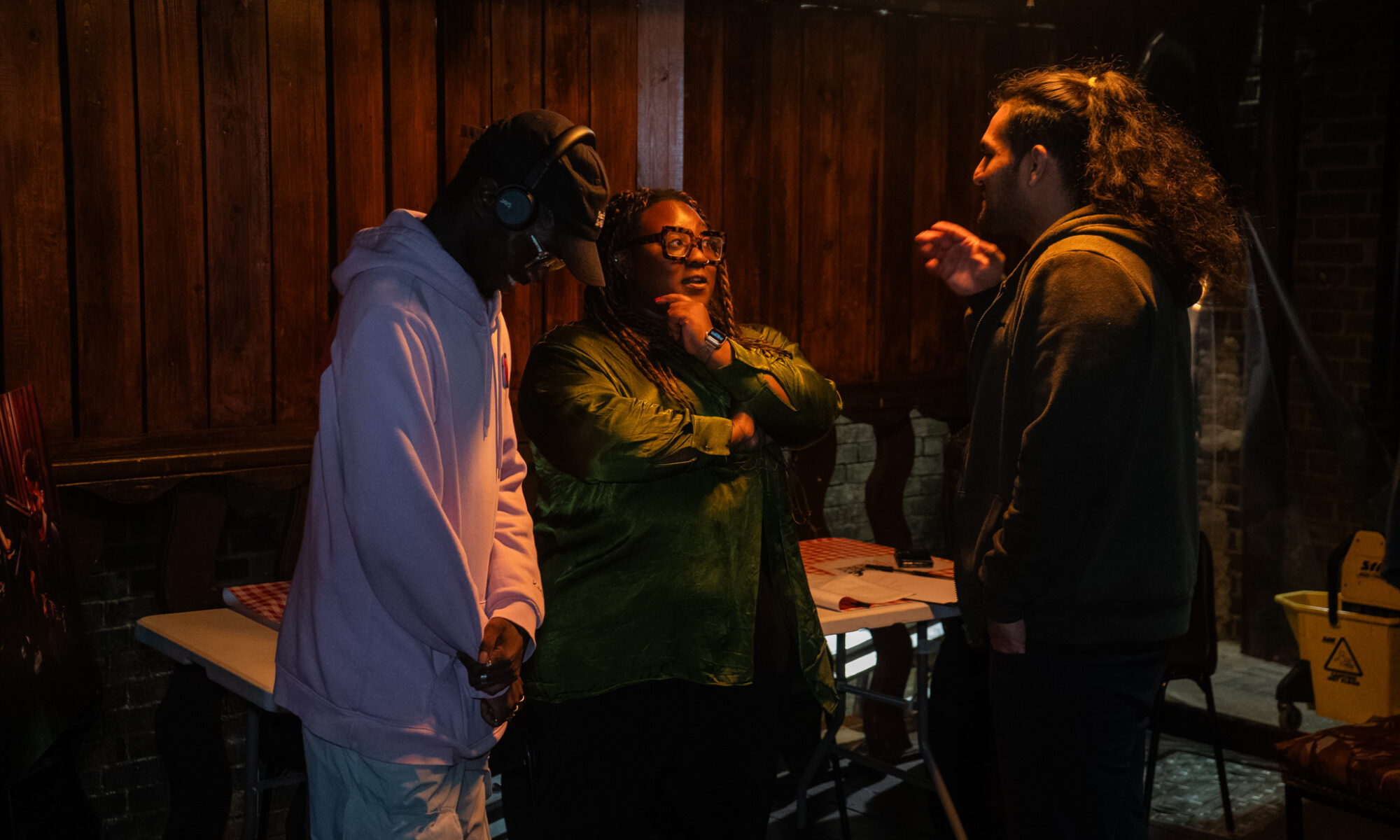 Three participants in active conversation