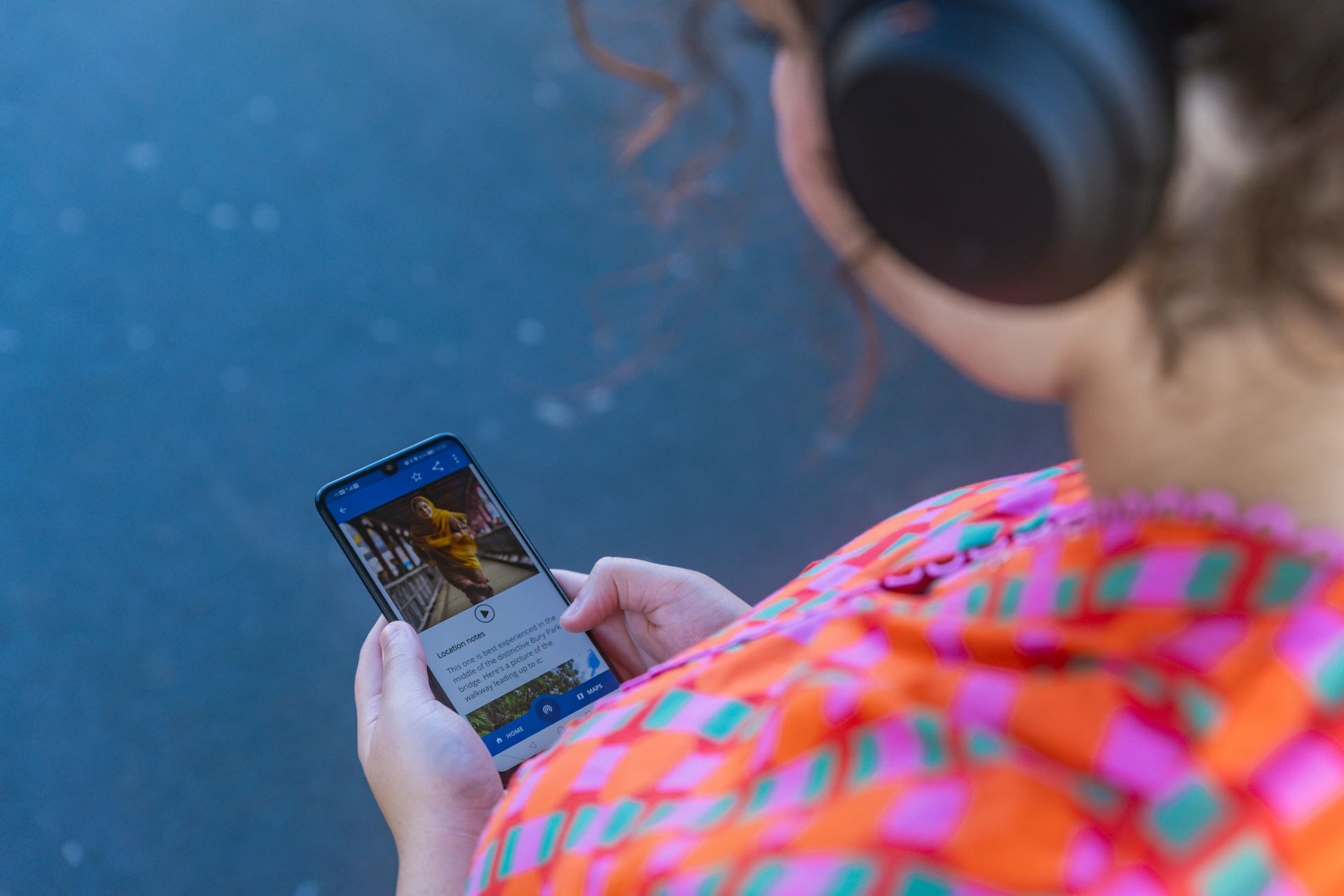 Woman wearing headphones listening to one of the stories