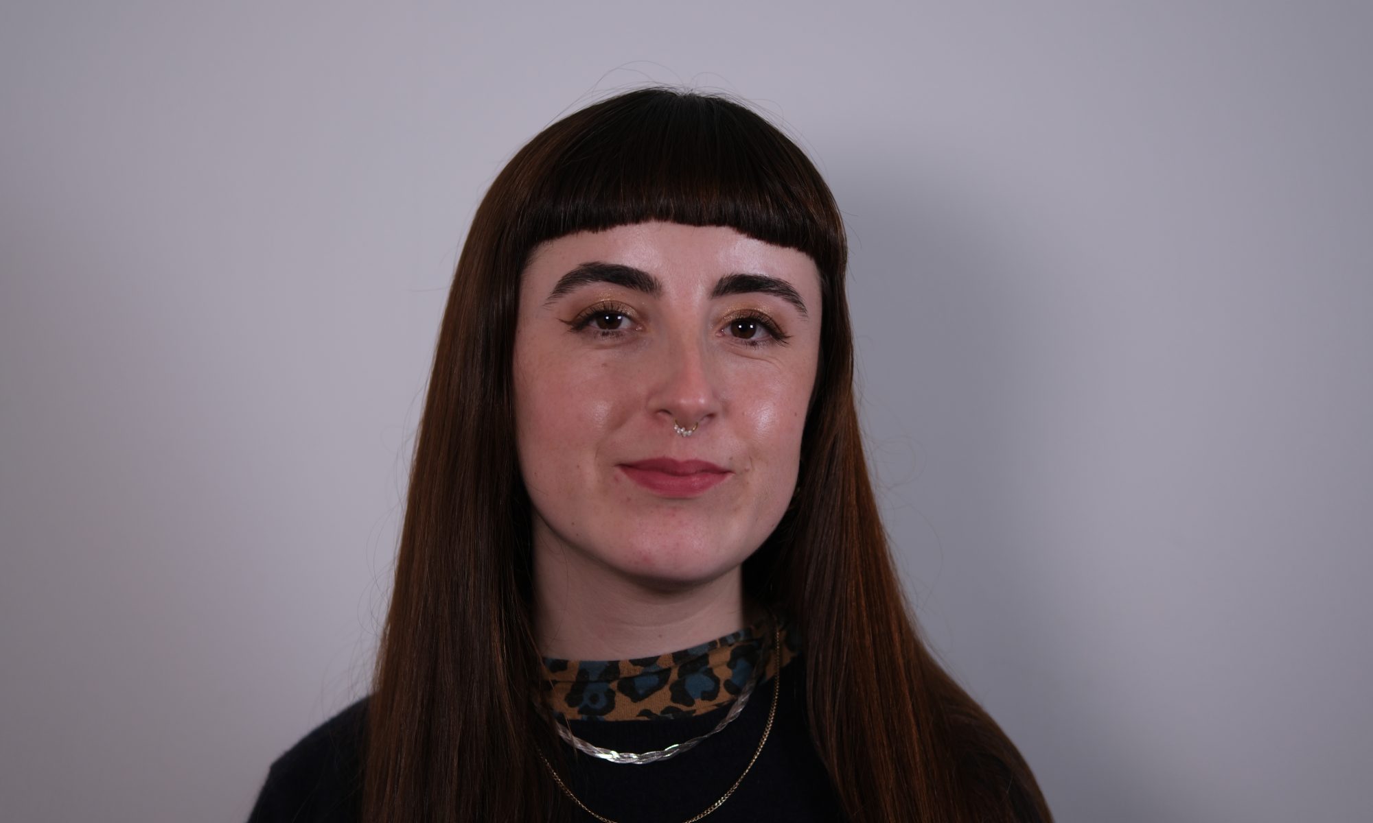 A headshot of a woman