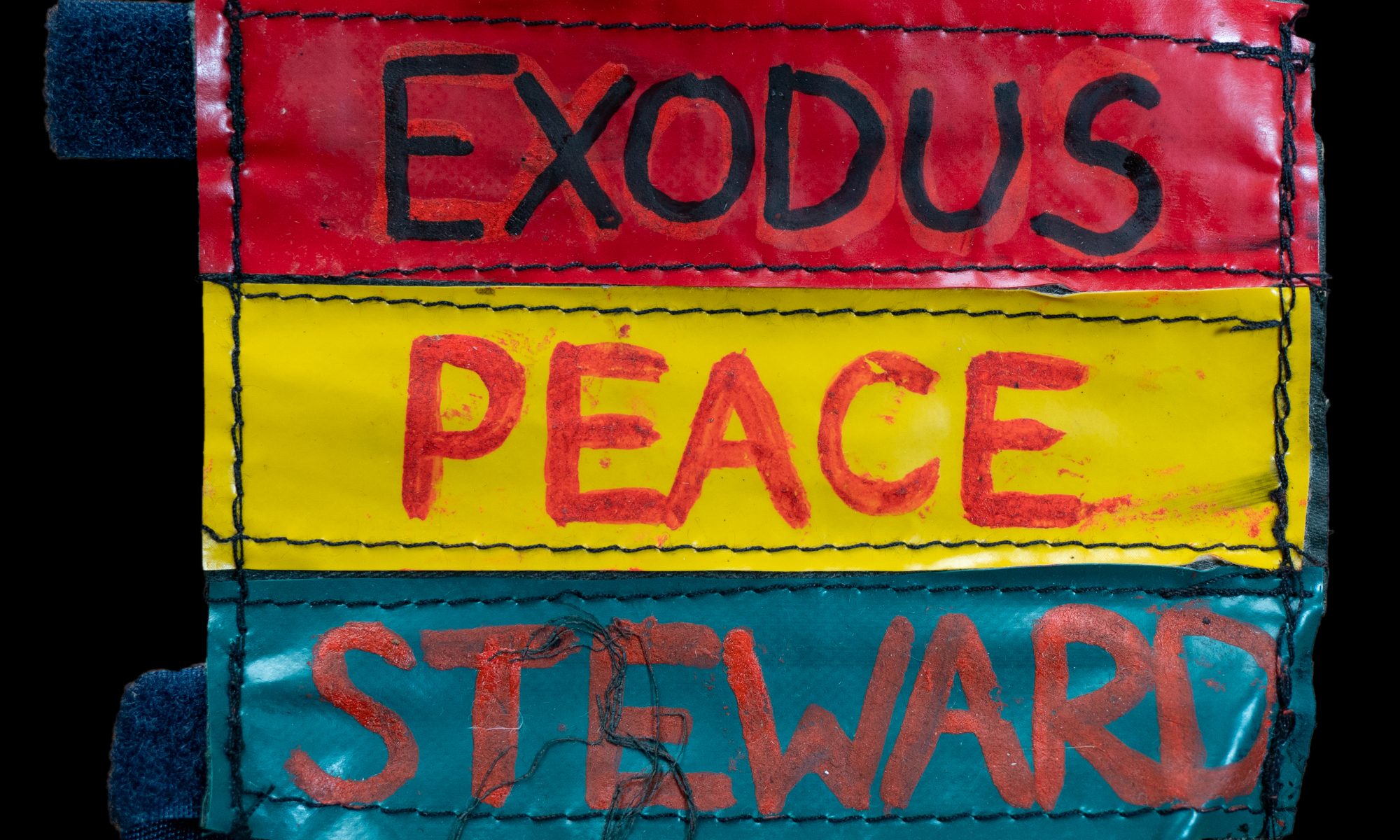 Badge reading 'Exodus Peace Steward'